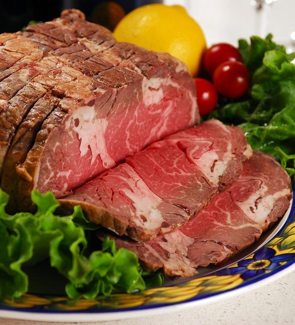 Beef steak with a green salad.